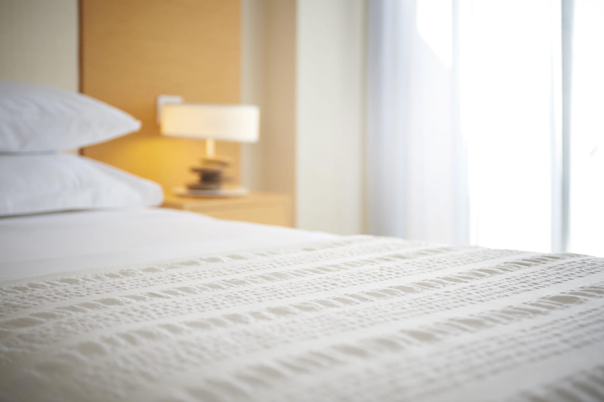 فندق كابو بيه بروتاراس المظهر الخارجي الصورة A bed