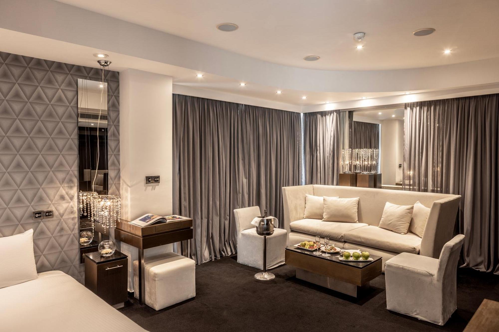 فندق كابو بيه بروتاراس المظهر الخارجي الصورة A suite at The Dorchester